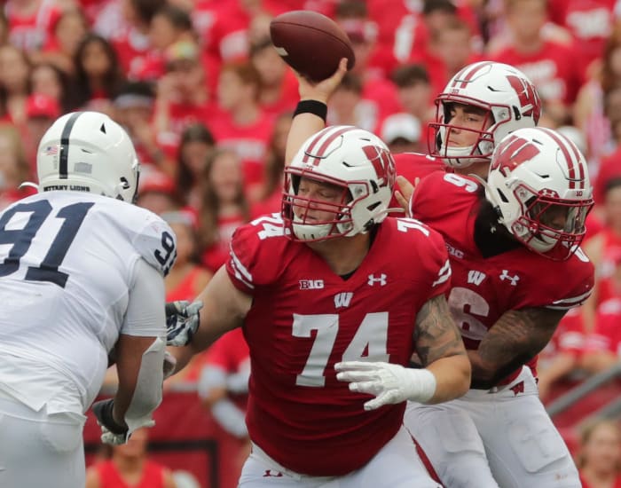Wisconsin offensive lineman Michael Furtney (No. 74) blocking against Penn State (Credit: Mark Hoffman-USA TODAY Sports)
